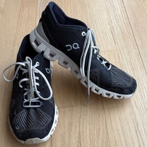 On Running Women’s Black and White Athletic Shoes